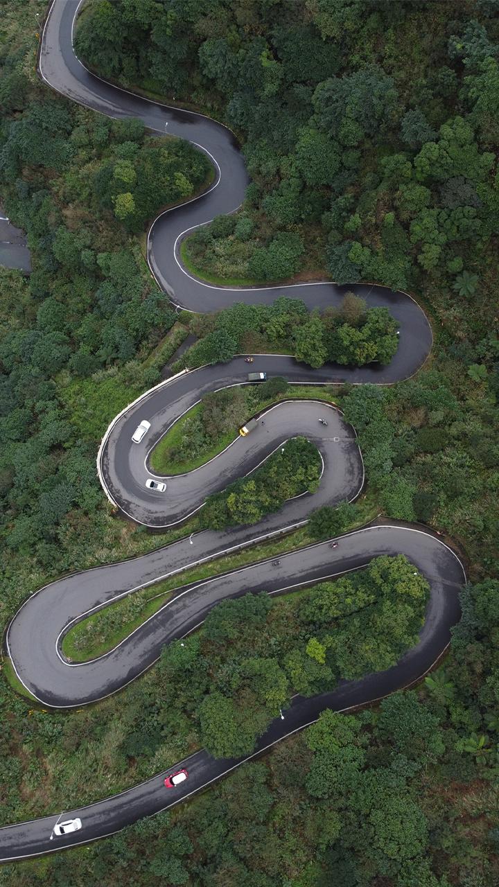 A vehicle on a mountain road